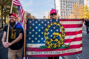 A Qanon supporter marches in route to the Supreme Court during the Million Maga March protest regarding election results on November 14, 2020 in Washington D.C.