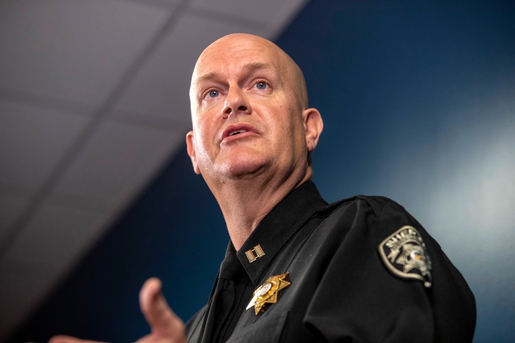 Captain Jay Baker, of the Cherokee County Sheriff's Office, speaks about the arrest of the Atlanta shooting suspect during a press conference at the Atlanta Police Department headquarters in Atlanta, Wednesday, March 17, 2021.