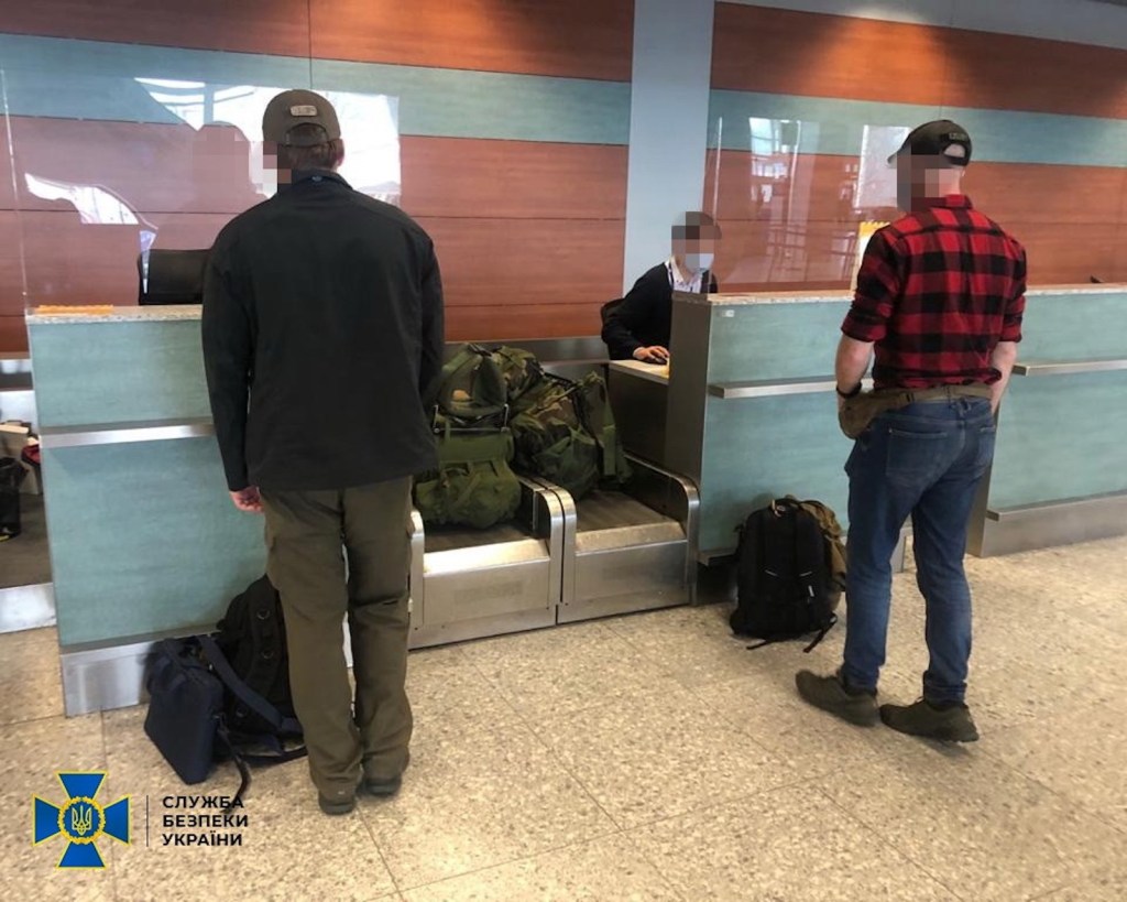 In October 2020, Ukrainian intelligence released a video of what it claimed was two American men in baseball caps carrying camouflage-patterned duffle bags as an agent escorted them to the baggage counter at the Kyiv airport. The video was likely choreogr