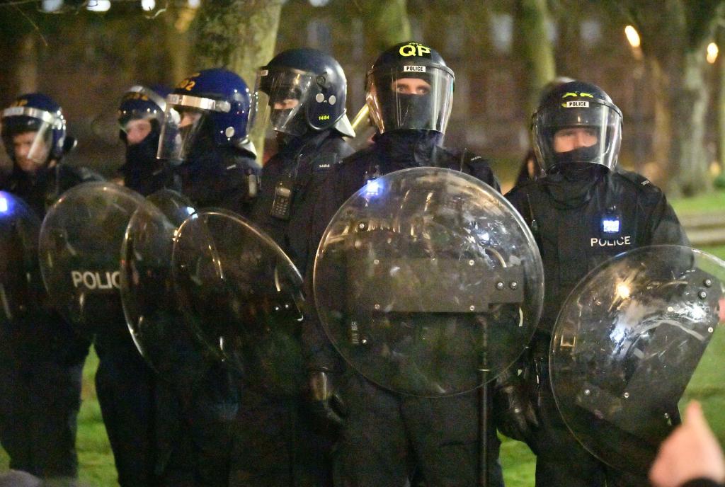 Police at College Green in Bristol where police said around 130 people had gathered earlier in the evening. Picture date: Tuesday March 23, 2021. Photo: PA Images / Alamy Stock Photo