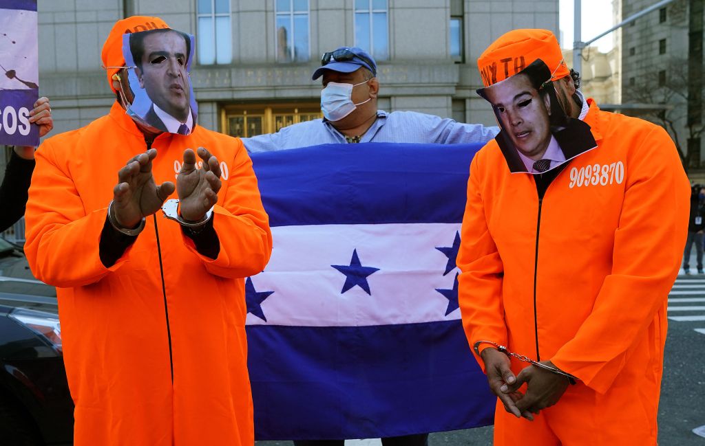 Protestors celebrate outside the US Southern District of New York on March 30, 2021 after Juan Antonio "Tony" Hernandez, brother of the president of Honduras Juan Orlando Hernandez was sentenced to life for drug trafficking.