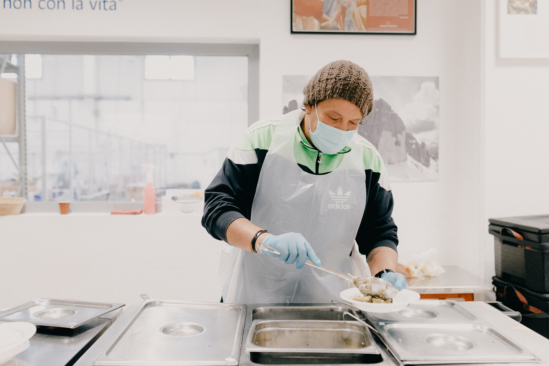 Giotto Bakery – A man serving up a dish in the staff-only canteen.