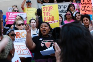 A woman speaks during a protest against recently passed abortion ban bills at the Georgia State Capitol building, on May 21, 2019 in Atlanta, Georgia.