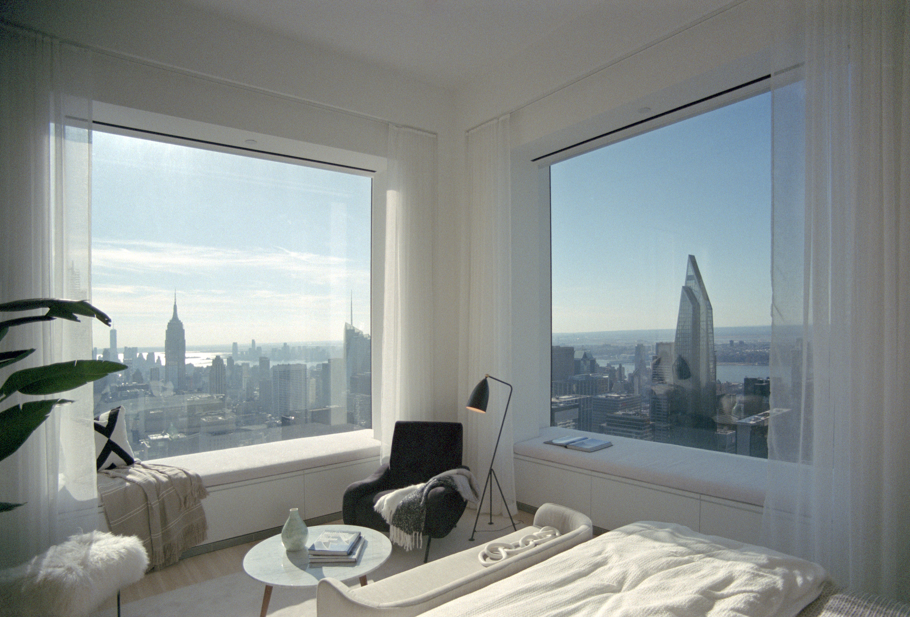 photo of the NYC skyline from a bedroom window