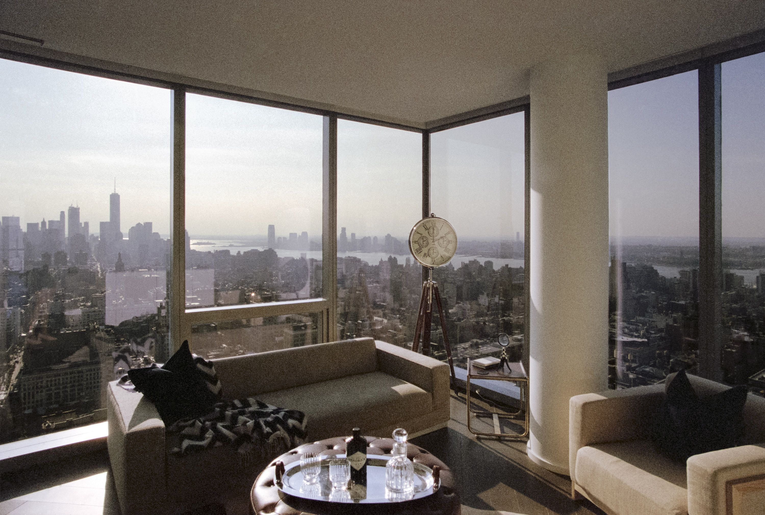 photo of the NYC skyline from a living room window