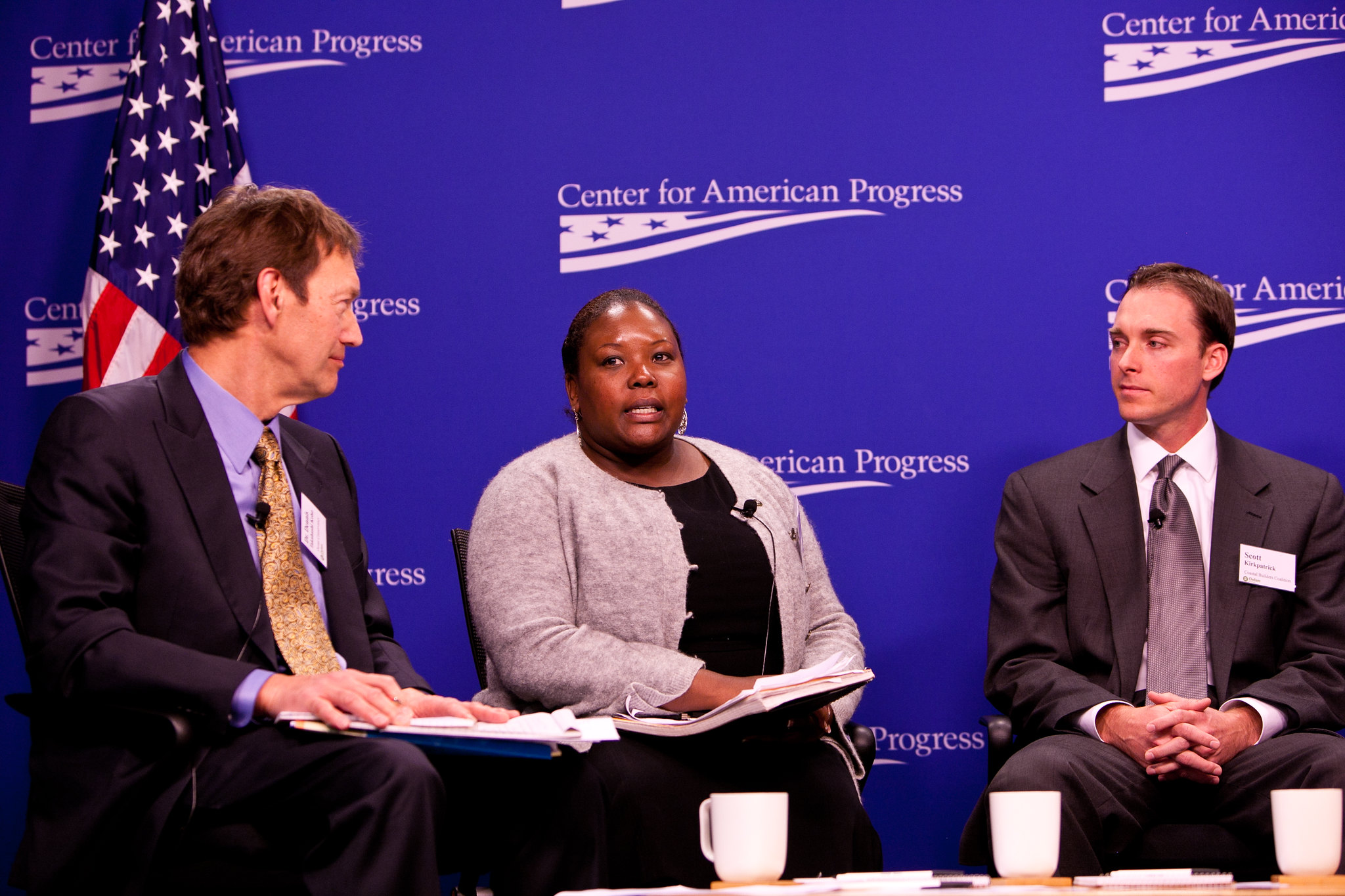 Ajulo Othow, center, has long been involved in looking for ways to bring solar to rural Black communities.