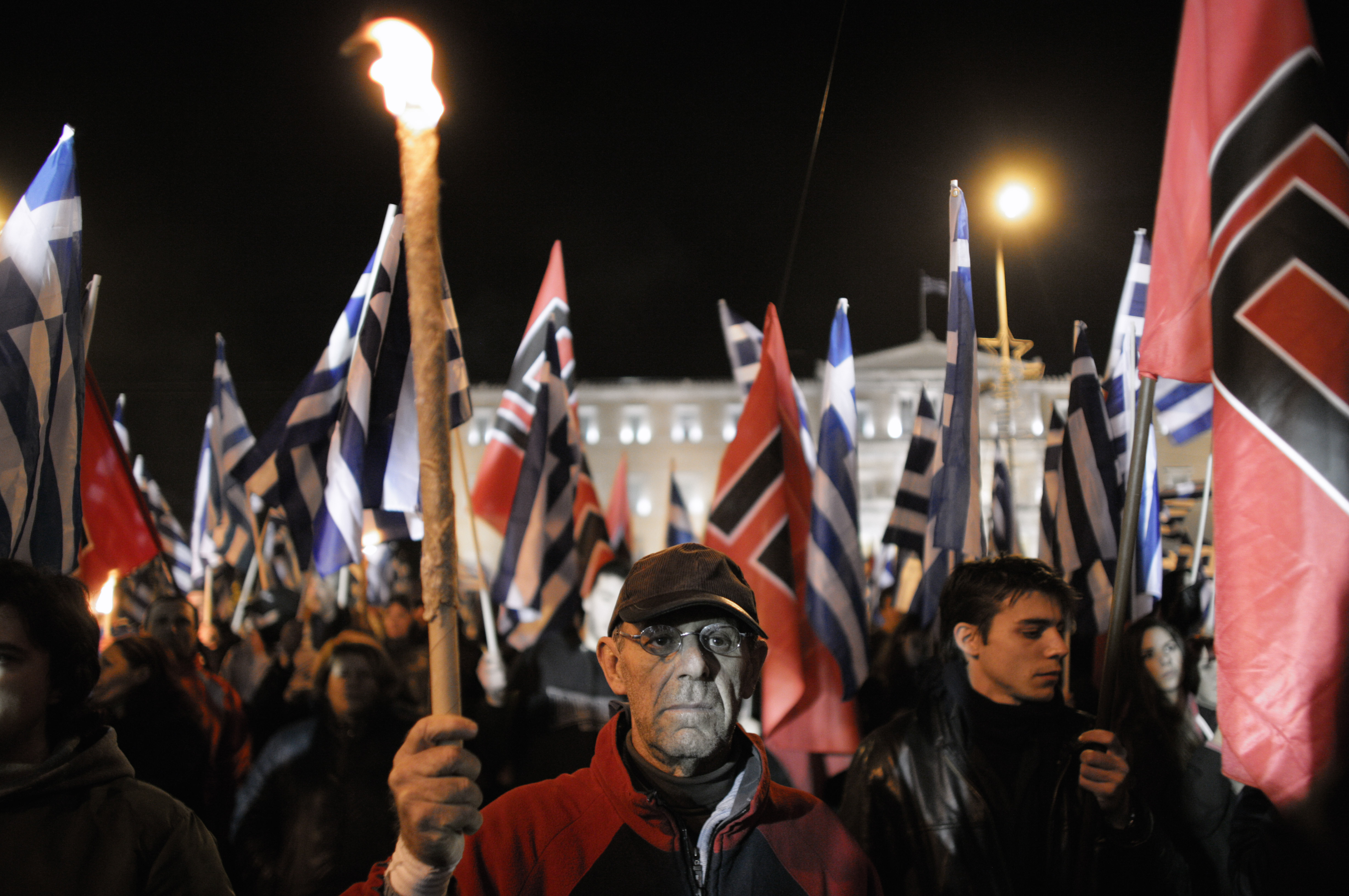 Golden Dawn supporters demonstrate outside the Greek parliament in 2013, demanding the release of the group's leaders from detention. Photo: Milos Bicanski/Getty Images