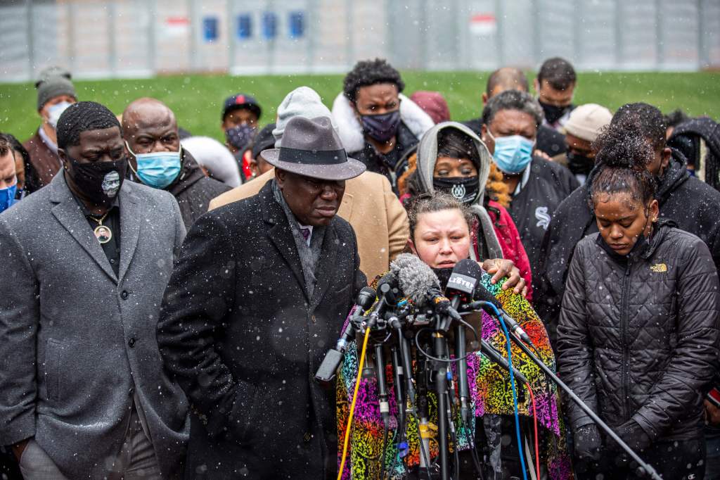 Katie Wright, center, the mother of Daunte Wright, speaks as other family and friends and family attorney Ben Crump, (2-L), listen during a press conference at the Hennepin County Government Center in Minneapolis, Minnesota on April 13, 2021.