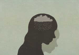 ​A silhouette of a sad person