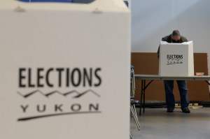 A voter is shown at a Whitehorse polling station during the Yukon election on Monday April 12, 2021.