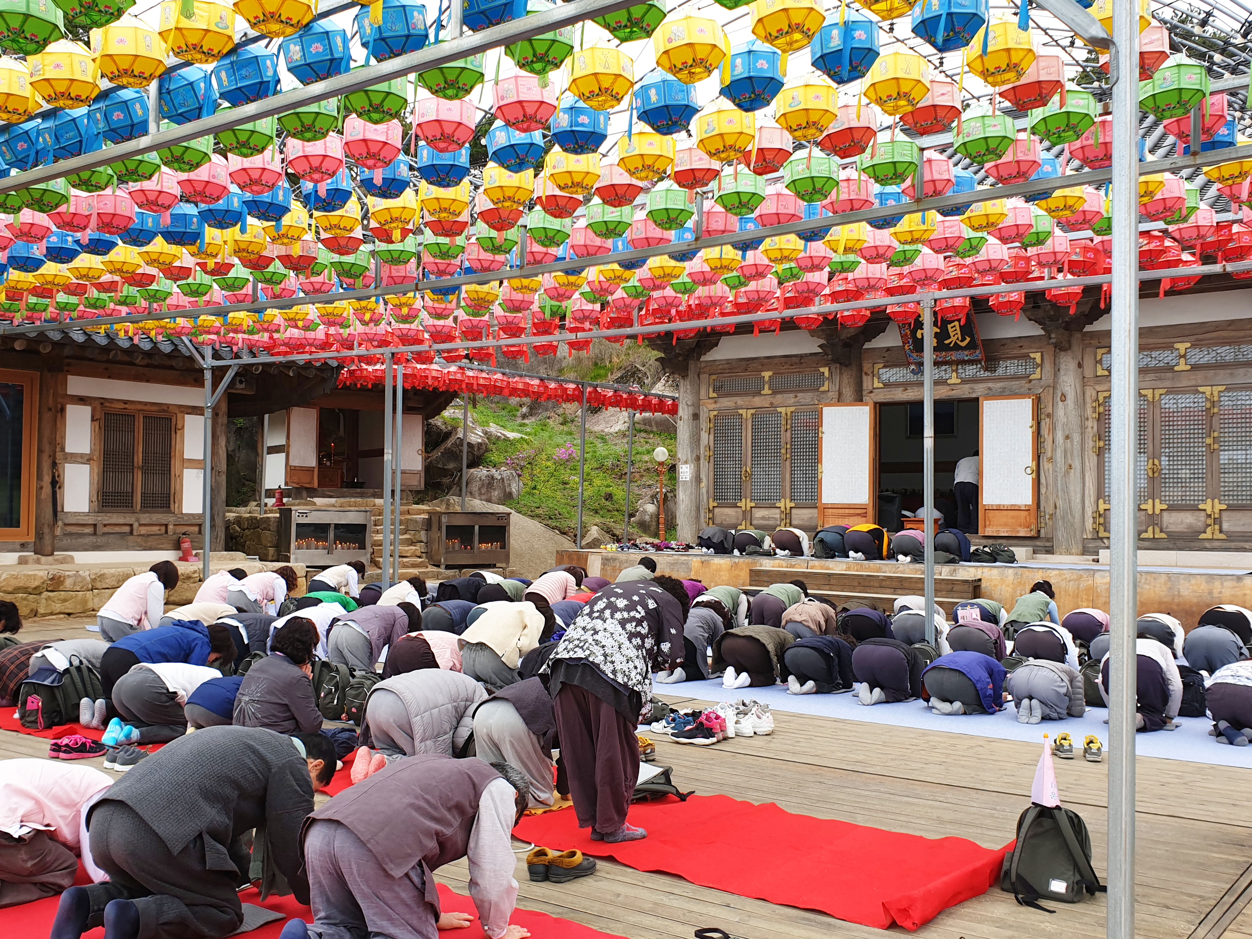 Prayer Pods Tent Buddhist temple South Korea COVID-19