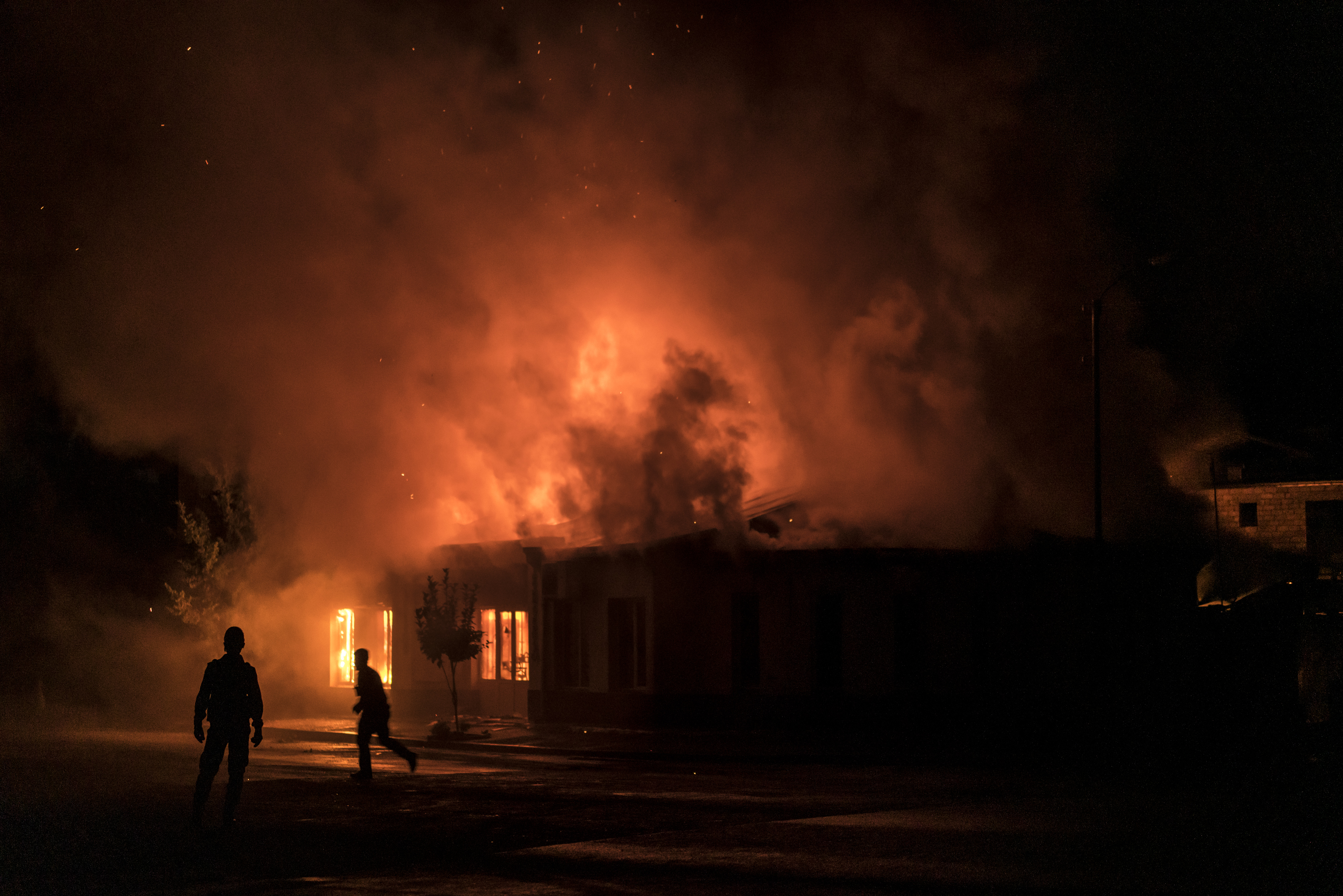 A fire burns following a rocket attack in Stepanakert last October. Photo: Brendan Hoffman/Getty Images