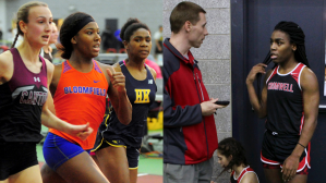 In this Feb. 7, 2019 file photo, Cromwell High School track coach Brian Calhoun, left, speaks to transgender athlete Andraya Yearwood during a break at a meet at Hillhouse High School in New Haven, Connecticut.