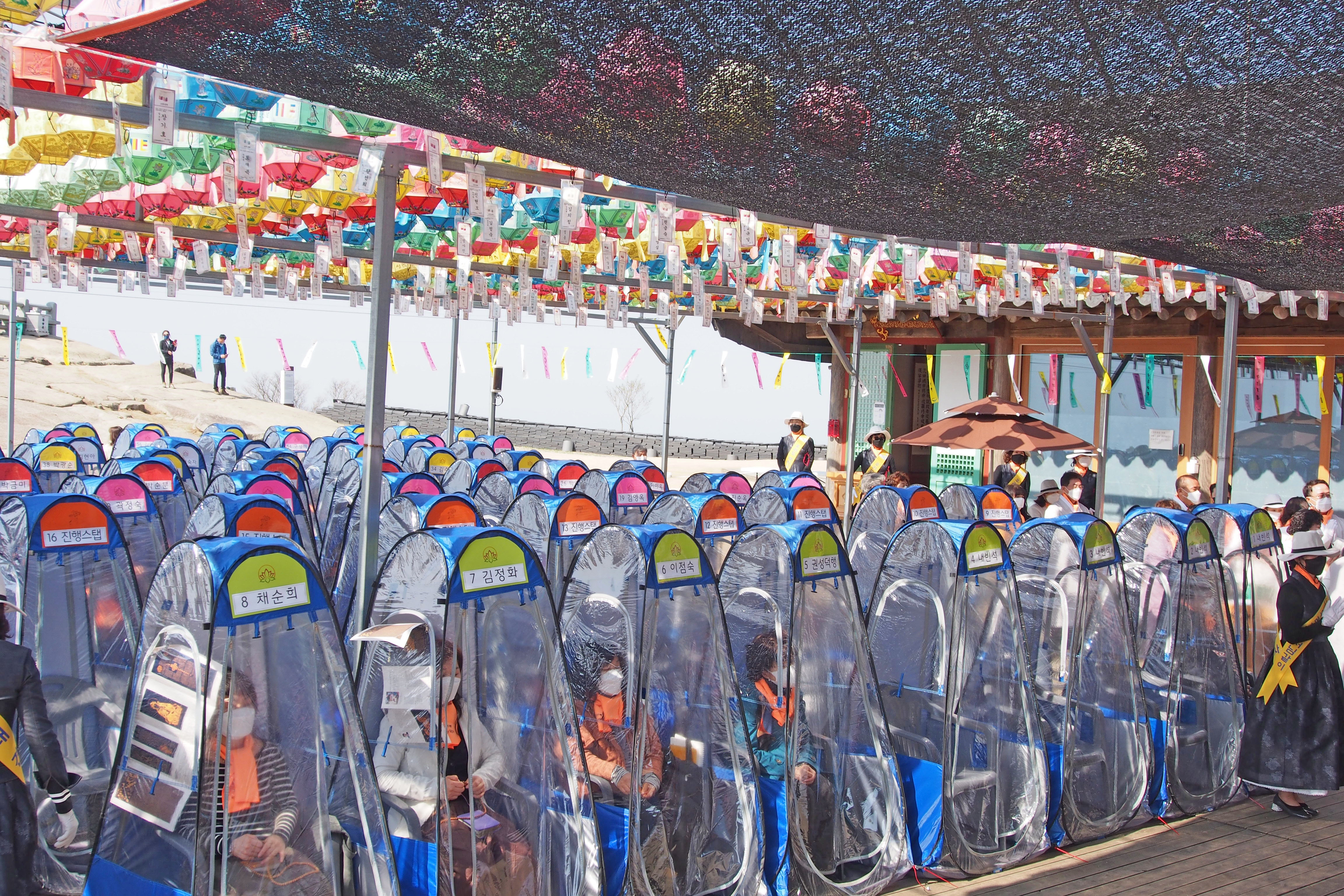 Prayer Pods Tent Buddhist temple South Korea COVID-19