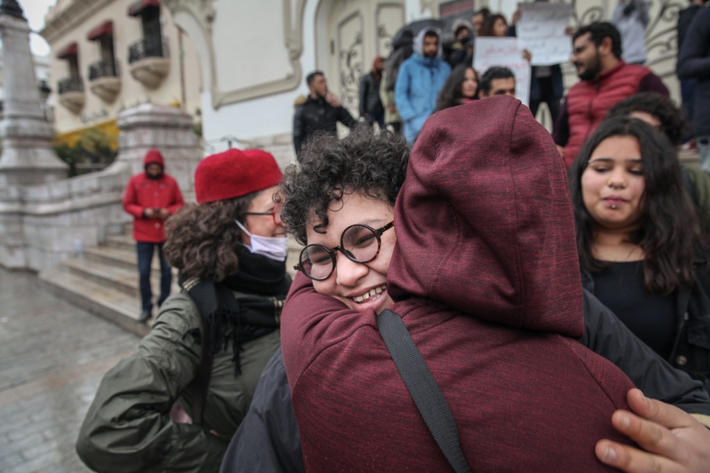 Rania Amdouni is welcomed as she attends a demonstration held on Habib Bourguiba Avenue in Tunis, Tunisia, on March 20, 2021​.