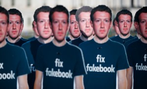 Life-sized cutouts of Facebook CEO Mark Zuckerberg wearing 'Fix Fakebook' t-shirts are displayed by advocacy group, Avaaz, on the South East Lawn of the Capitol on Capitol Hill in Washington, Tuesday, April 10, 2018.