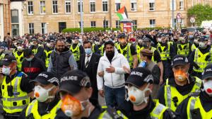 At approx 5.30PM police released two men from a Home Office detention vehicle. Accompanied by lawyer Aamer Anwar the men walked to a nearby mosque surrounded by hundreds of police and supporters who had previously been surrounding the vehicle and sitting