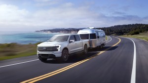 F-150 Lightning towing a big  camper