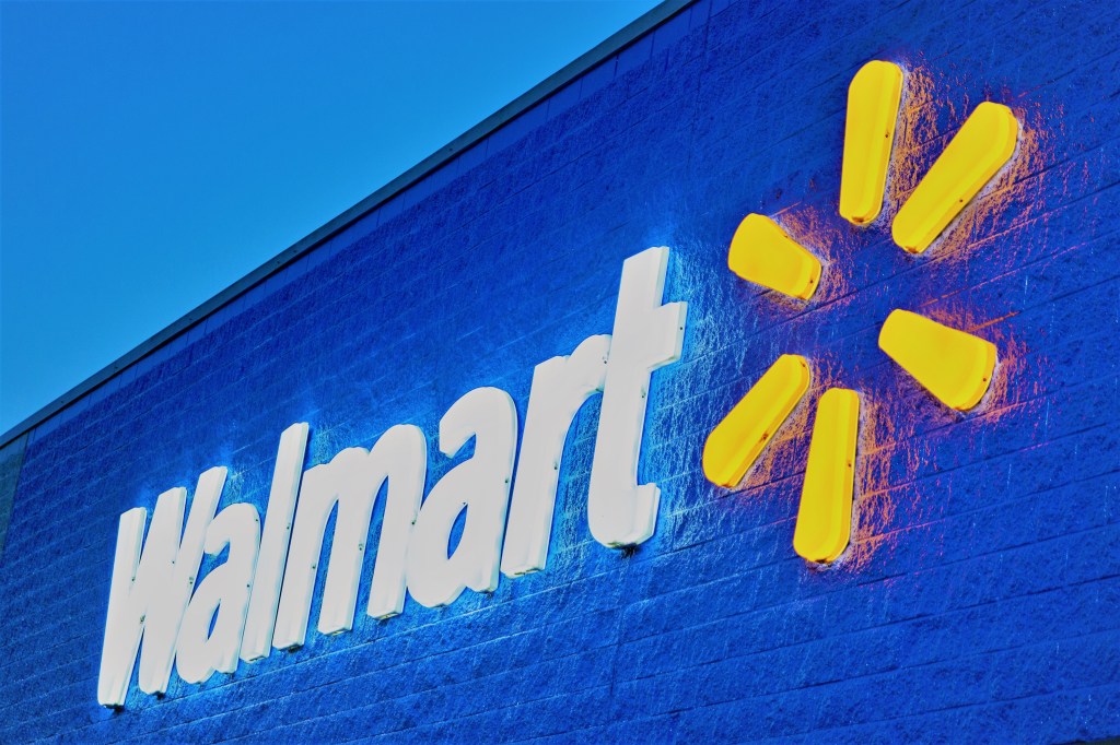 An extremely aesthetic Walmart sign at night.