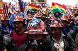 Miners take part in celebration festivities after a final official vote count released yesterday declared Luis Arce the winner of the presidential election, in El Alto, Bolivia, Saturday, Oct. 24, 2020. (