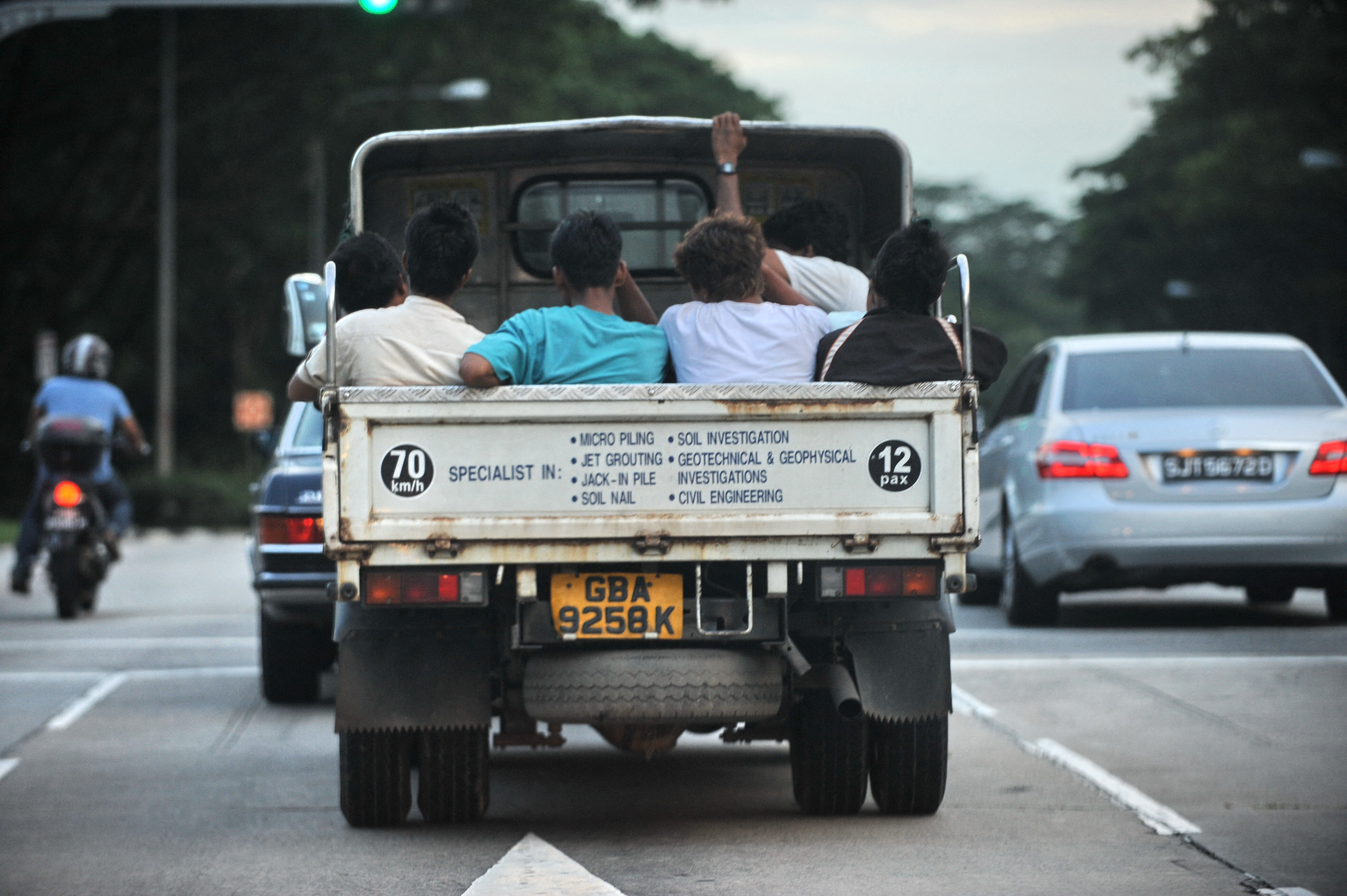 Laxed safety standards resulted in fatal road accidents involving migrant workers. Photo: Roslan Rahman / AFP