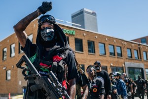 Members of the Black Panther Party and other armed demonstrators rally in the Greenwood district during commemorations of the 100th anniversary of the Tulsa Race Massacre on May 29, 2021 in Tulsa, Oklahoma.