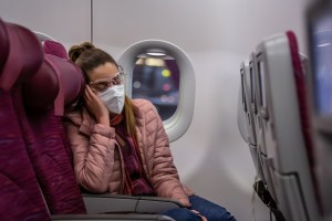 woman on plane sleeping