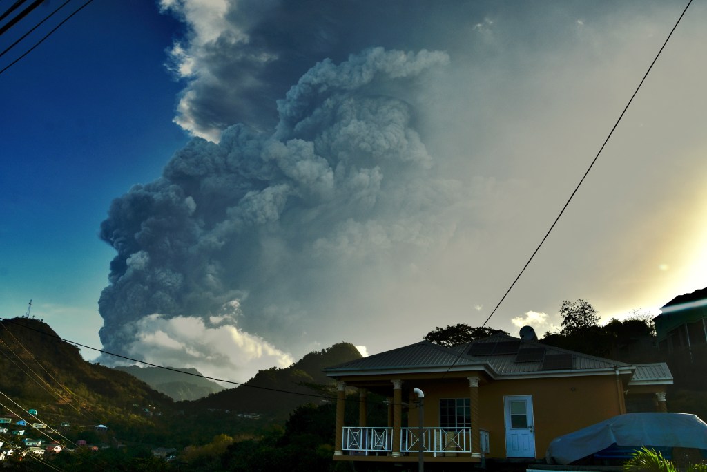 Ash rises from the La Soufriere volcano as it erupts on the eastern Caribbean island of St. Vincent in April 2021.