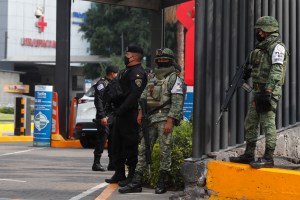 Military inspect vehicles as protocol security before drivers enter to Medica Sur Hospital, where Mexico City's chief of police, Omar Garcia Harfuch remains hospitalized after he was injured last Friday during a shooting in a dramatic assassination attemp