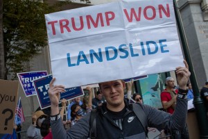 As Philadelphians celebrate in the streets as news agencies announce that Joe Biden has won enough electoral delegates to defeat President Trump in the Presidential election, a small gathering of Trump supporters protest that the election was stolen, in P