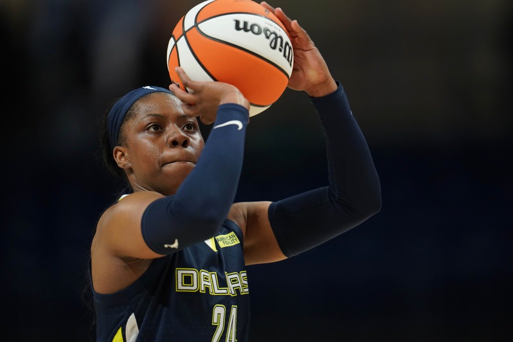 Arike Ogunbowale of the Dallas Wings shoots a free throw during the game against the Los Angeles Sparks