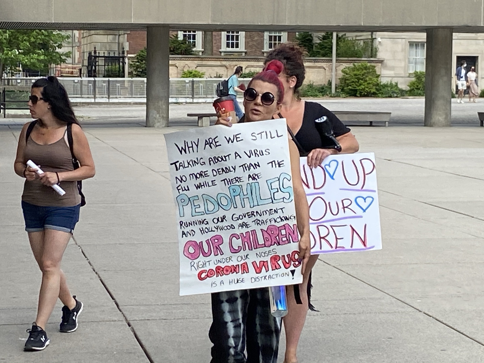 A protest at a Toronto vaccination centre giving teenagers vaccines. Photo by Caryma Sa'd