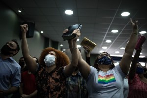 Members of ICC attend the weekly worship service at the church’s headquarter in northern Rio de Janeiro. The majority of the worshippers are gay couples -- both men and women -- who who feel accepted here and have felt shunned elsewhere.