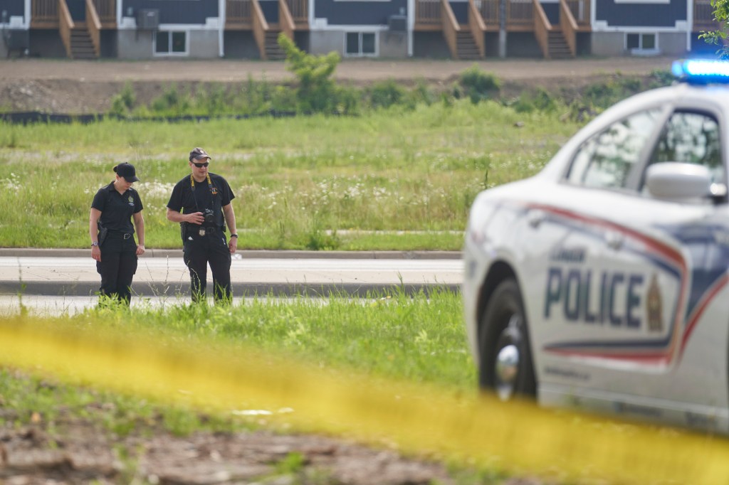 London police investigate the scene of a fatal attack in London, Ontario on Monday, June 7, 2021.