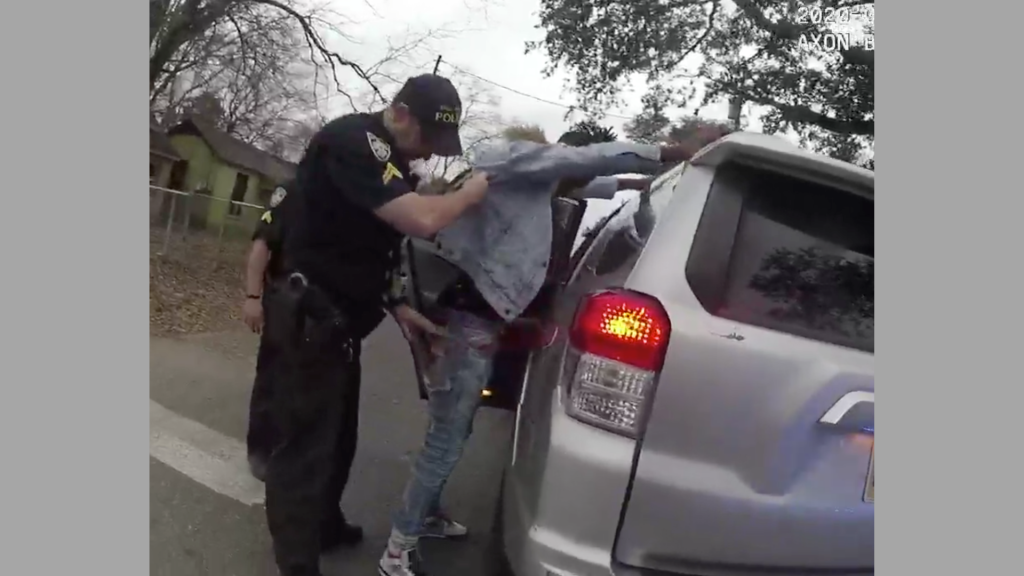 ​A screenshot from police body camera footage after police stopped Clarence Green and his teen brother.