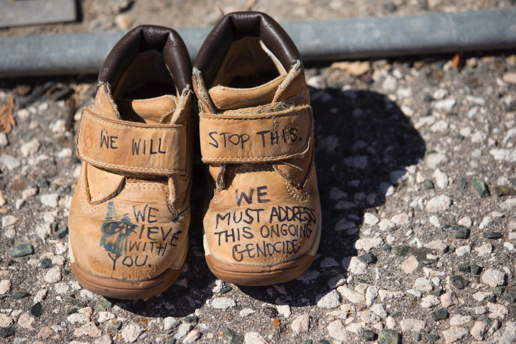 Shoes honouring the 215 children found at former Kamloops Indian Residential School