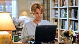 Meg Ryan menggunakan komputer dalam film You've Got Mail