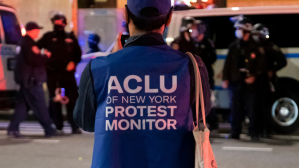 Rear View of ACLU Protest Monitor at Night before Election, Greenwich Village, New York City, USA .