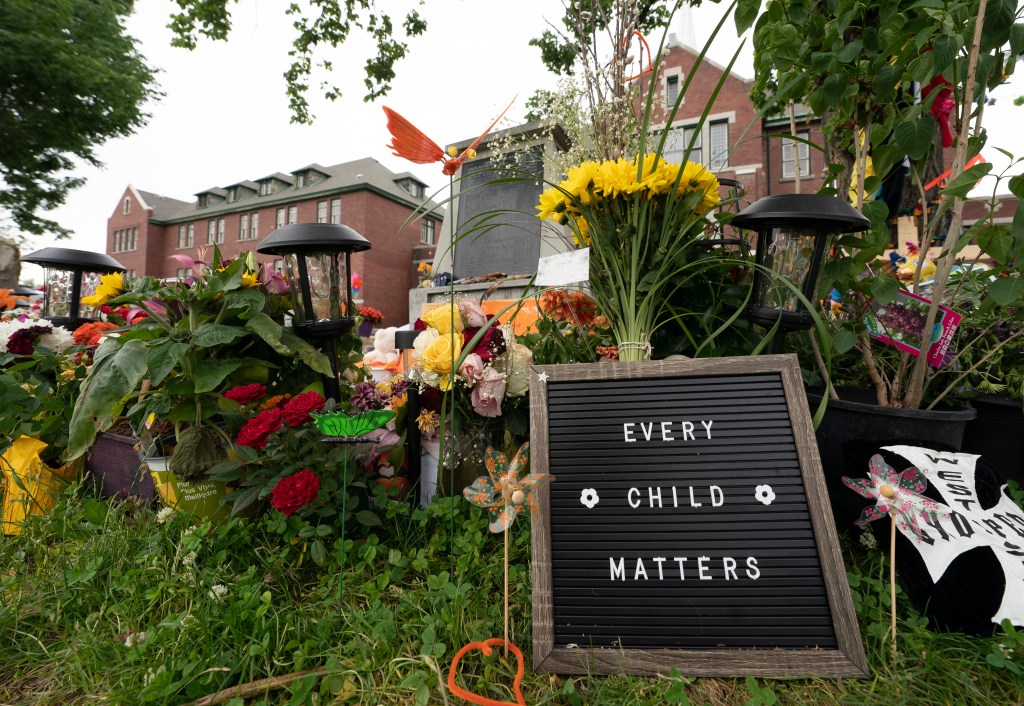 ​A memorial ​outside Kamloops Residential School in British Columbia honouring the 215 ​​children.