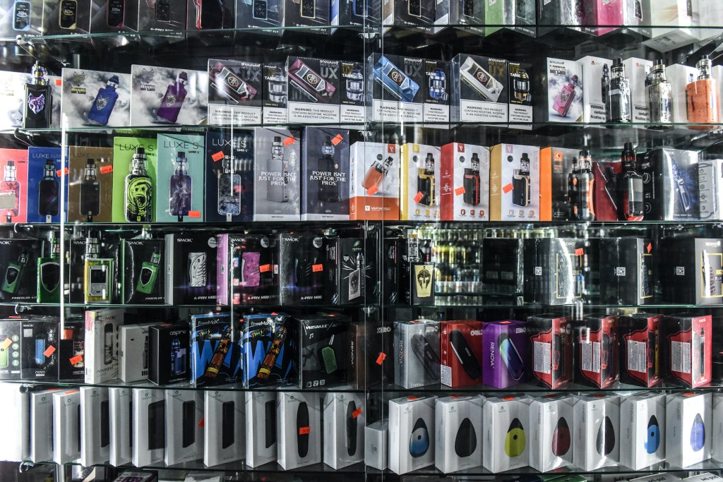 Vaping and e-cigarette products are displayed in a store on December 19, 2019 in New York City.