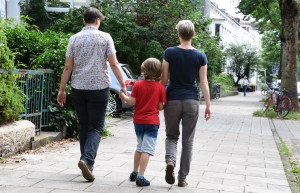 A married lesbian couple go walking with their son in Bremen, Germany, 24 June 2016.