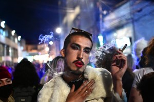 Sebastián Guzmán, a fashion designer also known as "Mr. Gorgeous," poses at the anti-Theatron protest on June 4.