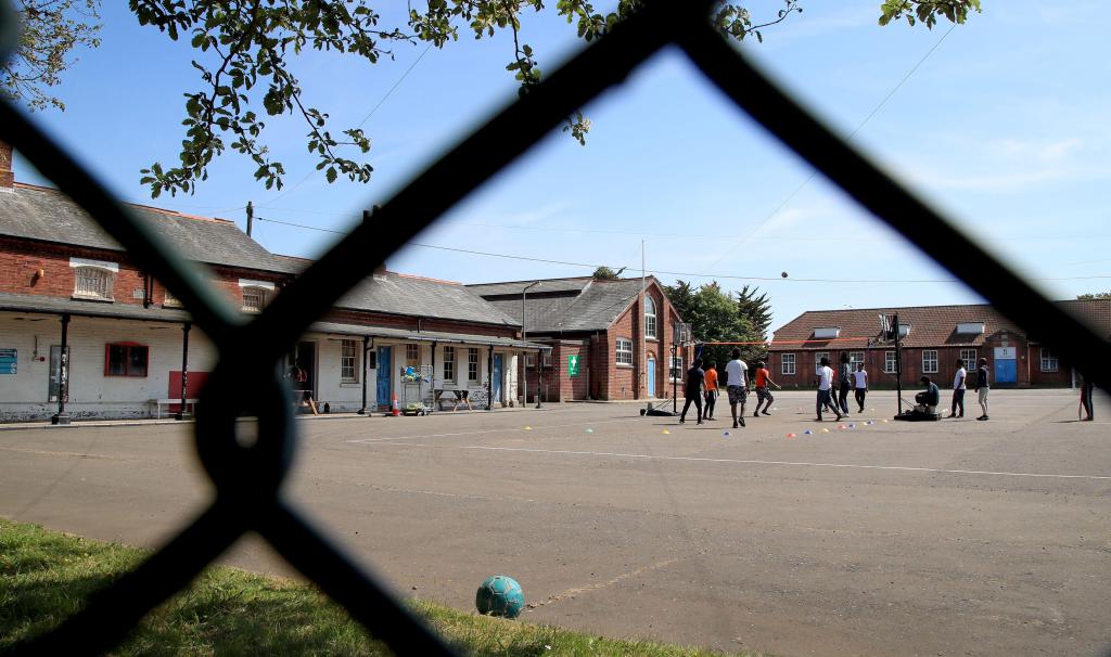 Asylum seekers and undocumented migrants staying at Napier Barracks in Kent, where the Homes Office unlawfully kept residents in squalid conditions. Photo: PA Images / Alamy Stock Photo