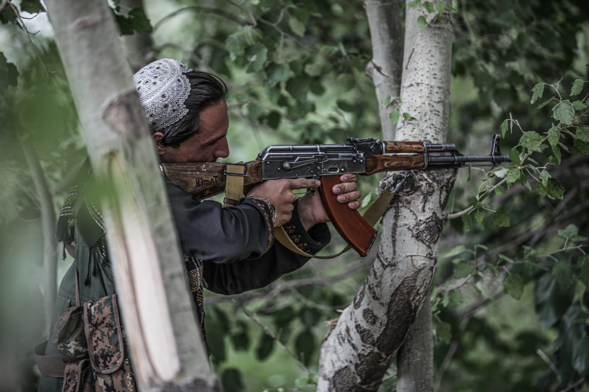 A Taliban fighter in the Band-e-chak district of Wardak Province stands guard with a Kalashnikov rifle. (Photo: Adam Desiderio/VICE News)