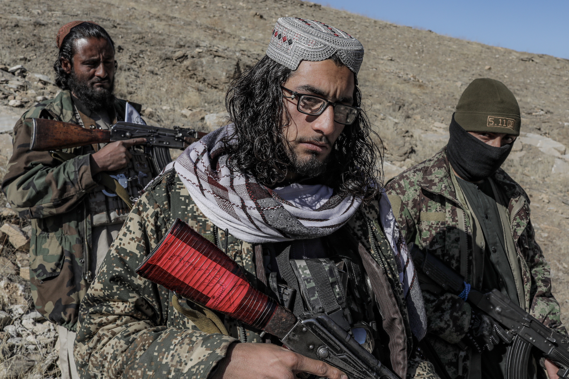 Taliban fighters stand guard in the Tangi Valley, Afghanistan.