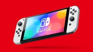 An image of a Nintendo Switch (OLED) floating on a red background