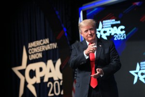 Former U.S. President Donald Trump gestures while arriving to speak during the Conservative Political Action Conference (CPAC) in Dallas, Texas, U.S., on Sunday, July 11, 2021. (Photographer: Dylan Hollingsworth/Bloomberg via Getty Images​)