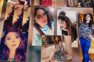 A composite of photos of Rabia Masih is seen at her house in Lahore on May 23, 2021. Masih died in February 2021.