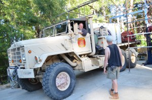 Weed grower Robert Steffano talks to a neighbor from his rigged firefighting truck "The Wookie.”