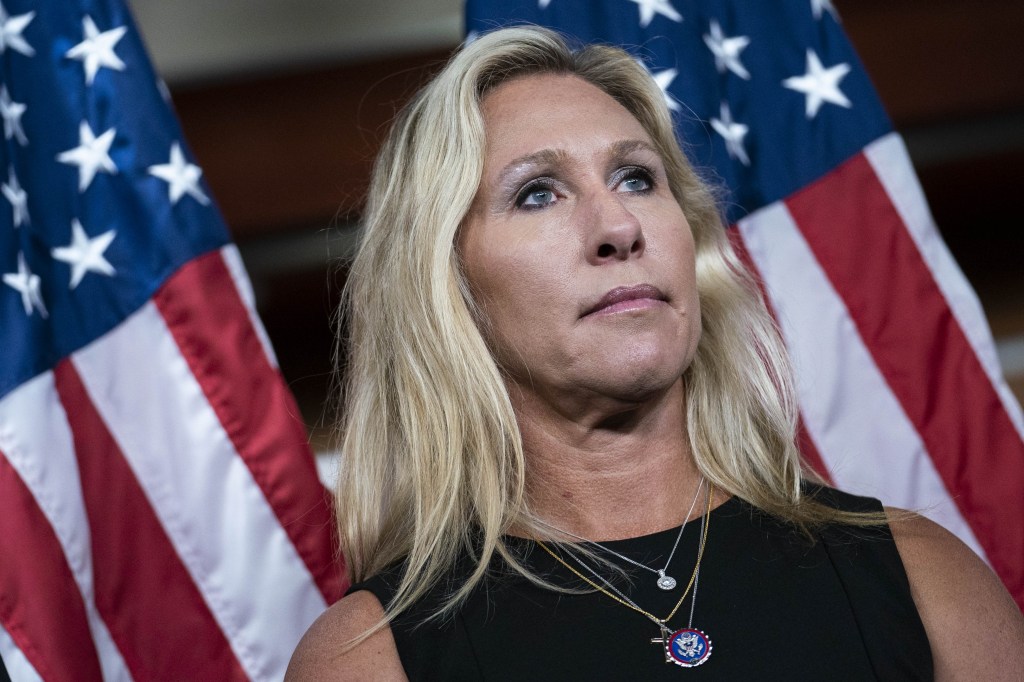 Representative Marjorie Taylor Greene, a Republican from Georgia, listens during a news conference to call for the firing of Anthony Fauci at the U.S. Capitol in Washington, D.C., U.S., on Tuesday, June 15, 2021. (Sarah Silbiger/Bloomberg via Getty Images